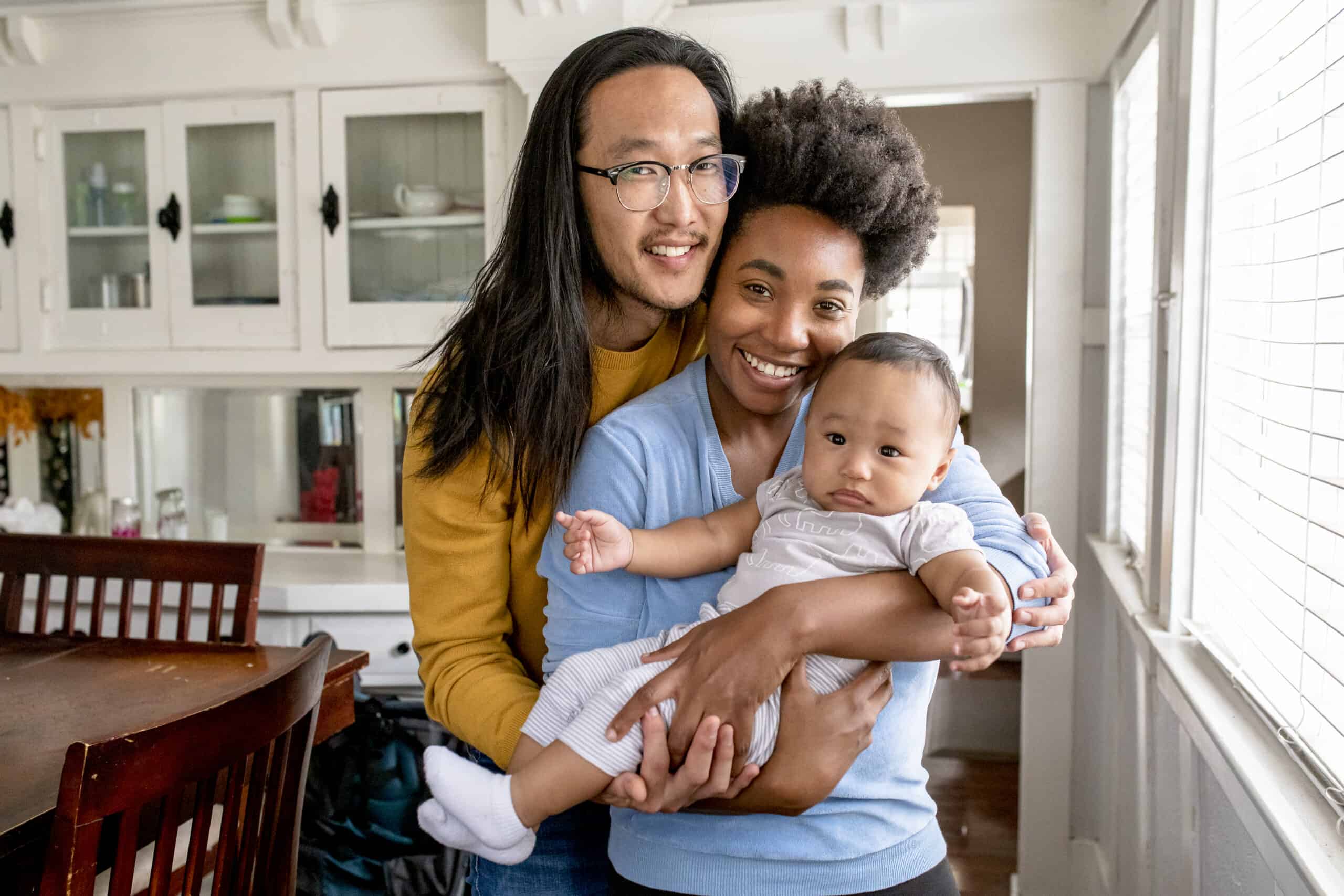 happy multiethnic family spending time together in the new norma